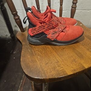 Red and Black Athletic Shoes